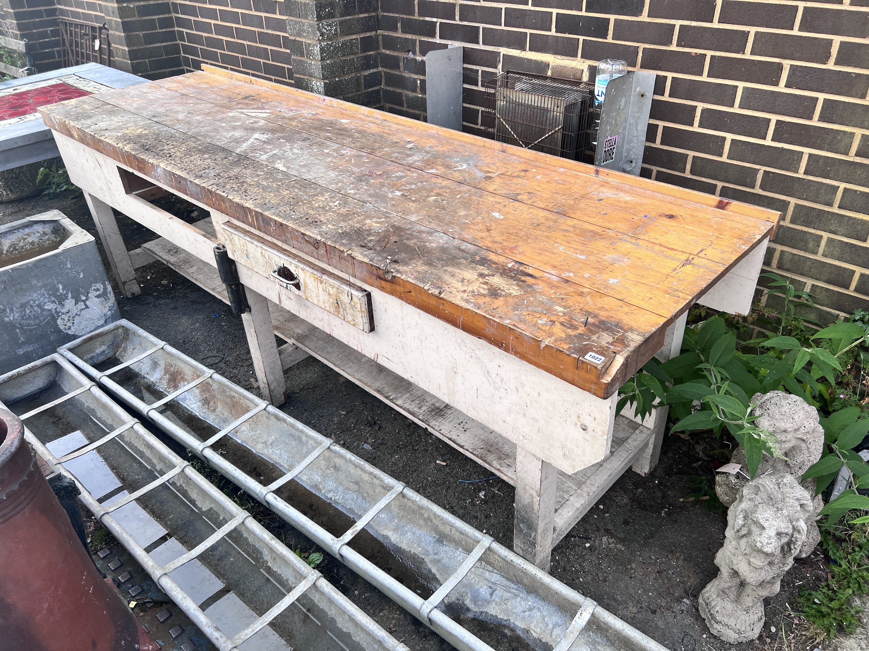 A vintage pine work bench with painted base, width 274cm, depth 80cm, height 93cm